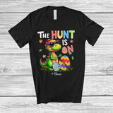 MacnyStore - Personalized Custom Name The Hunt Is On; Colorful Easter T-Rex Dinosaur Sunglasses; Egg Hunt T-Shirt
