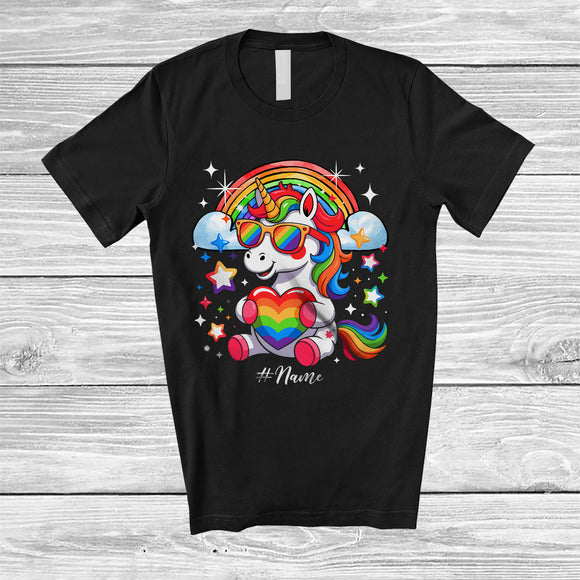 MacnyStore - Personalized Custom Name Unicorn Holding Heart; Adorable LGBTQ Rainbow Gay Pride Rainbow T-Shirt