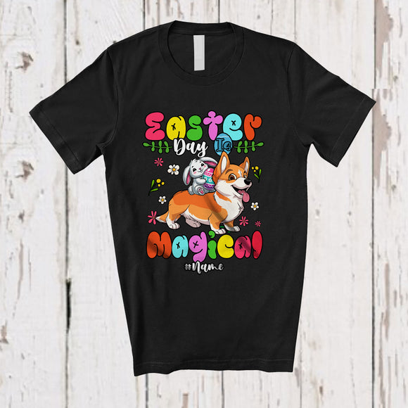 MacnyStore - Personalized Easter Day Is Magical; Lovely Bunny Riding Corgi; Custom Name Family Egg Hunt T-Shirt
