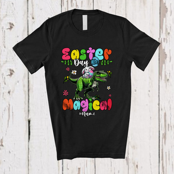 MacnyStore - Personalized Easter Day Is Magical; Lovely Bunny Riding T-Rex; Custom Name Family Egg Hunt T-Shirt