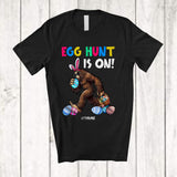 MacnyStore - Personalized Egg Hunt Is ON; Awesome Easter Bunny Bigfoot Hunting Eggs; Custom Name Family T-Shirt