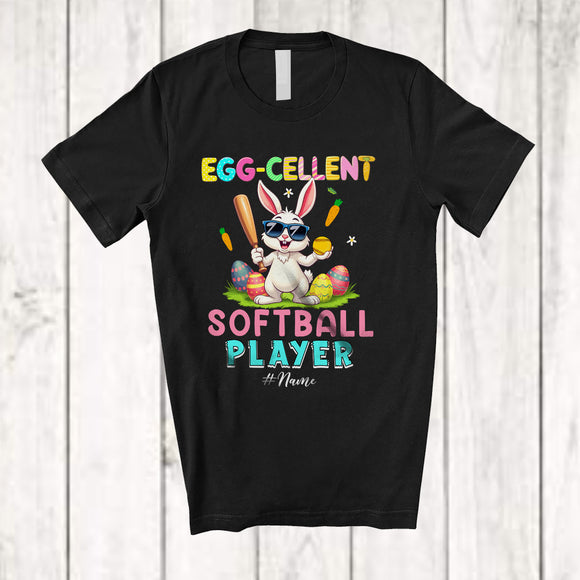 MacnyStore - Personalized Egg-cellent Softball Player; Lovely Easter Bunny Eggs Excellent; Custom Name Sport T-Shirt