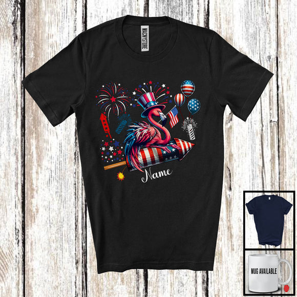 MacnyStore - Personalized Flamingo Riding Firecracker, Lovely 4th Of July USA Flag Custom Name Flamingo Lover T-Shirt