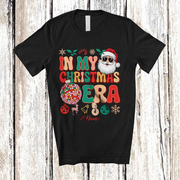 MacnyStore - Personalized In My Christmas Era; Amusing Custom Name Friends Family; Groovy Santa T-Shirt