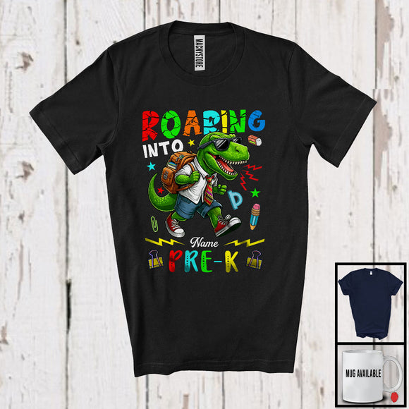 MacnyStore - Personalized Roaring Into Pre-K, Amazing First Day Of School T-Rex Dinosaur, Custom Name T-Shirt