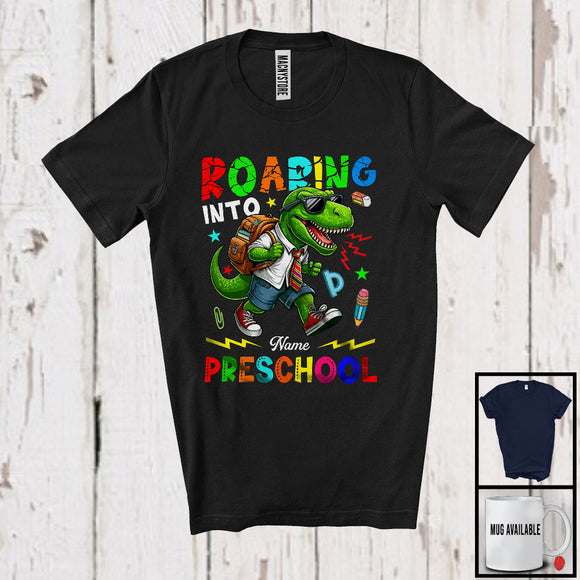MacnyStore - Personalized Roaring Into Preschool, Amazing First Day Of School T-Rex Dinosaur, Custom Name T-Shirt