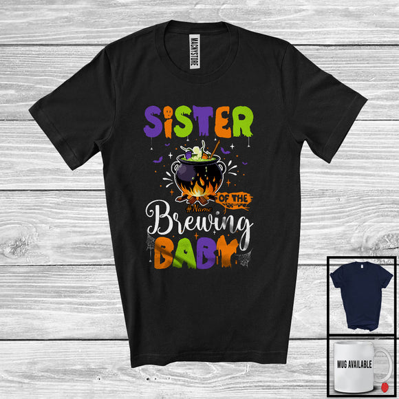 MacnyStore - Personalized Sister Of The Brewing Baby, Humorous Halloween Pregnancy Custom Name, Witch Family T-Shirt