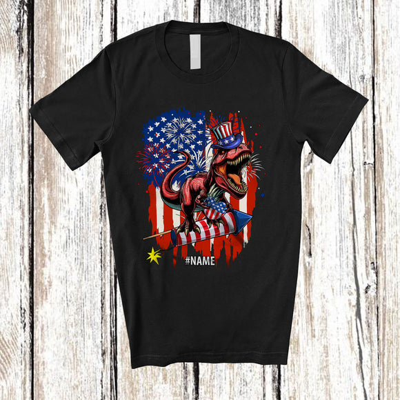 MacnyStore - Personalized T-Rex Riding Firecracker; Awesome 4th Of July US Flag; Custom Name Patriotic T-Shirt