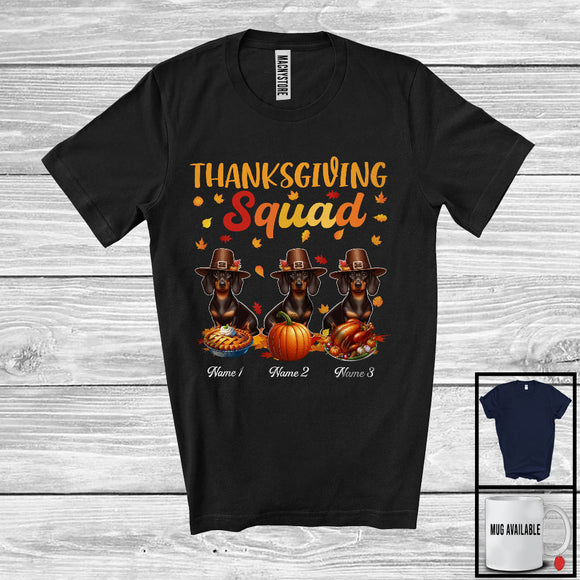 MacnyStore - Personalized Thanksgiving Squad, Lovely Three Pilgrim Dachshunds, Custom Name Fall Leaves T-Shirt