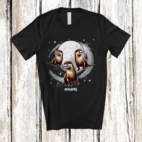 MacnyStore - Personalized Three Otter On Moon; Humorous Custom Name Otter Sea Animal Space T-Shirt