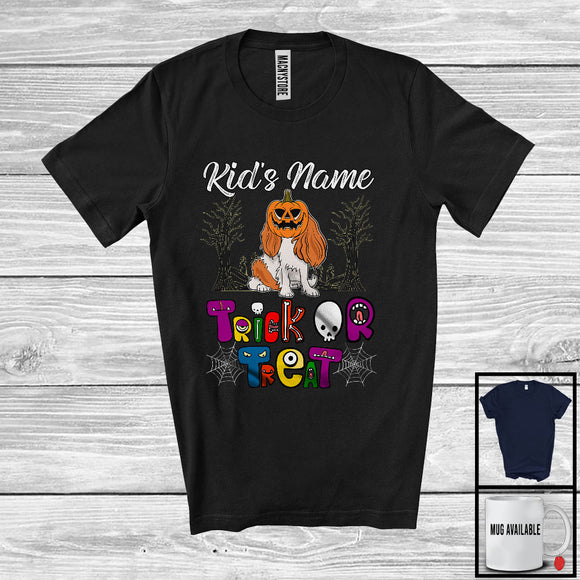 MacnyStore - Personalized Trick Or Treat, Humorous Halloween King Charles Spaniel Custom Name, Pumpkin Face T-Shirt