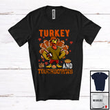 MacnyStore - Turkey And Touchdowns, Awesome Thanksgiving Turkey Football, Fall Leaves Sport Player T-Shirt