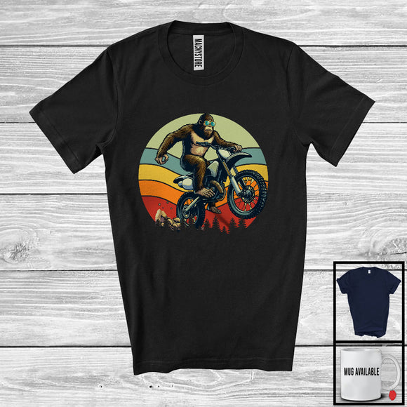 MacnyStore - Vintage Retro Bigfoot Riding Dirt Bike, Humorous Bigfoot Lover, Matching Dirt Bike Family Group T-Shirt