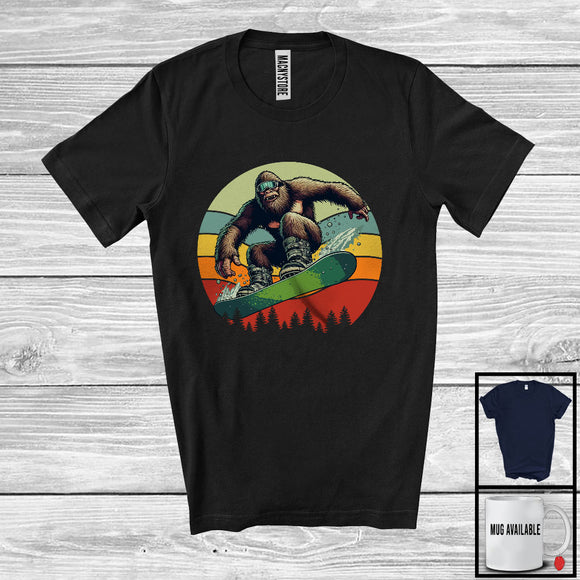 MacnyStore - Vintage Retro Bigfoot Snowboarding, Humorous Bigfoot Lover, Snowboarding Family Group T-Shirt