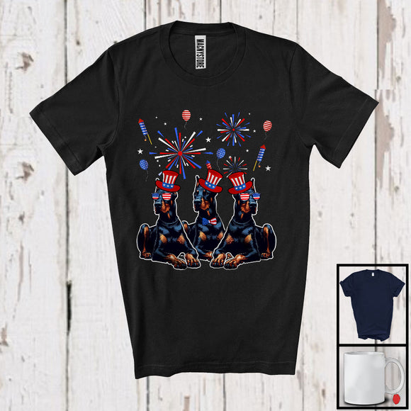 MacnyStore - Three Dobermann Dogs With USA Flag Glasses, Cool 4th Of July Fireworks USA Flag, Patriotic T-Shirt