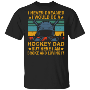 Vintage Retro I Never Dreamed I Would Be A Hockey Dad But Here I Am Broke And Loving It Cool Hockey Helmet Sticks Shirt T-Shirt - Macnystore