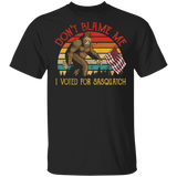 Vintage Retro Don't Blame Me I Voted For Sasquatch Cool Bigfoot Holding American Flag Shirt Sasquatch Bigfoot Lover Fans Gifts T-Shirt - Macnystore