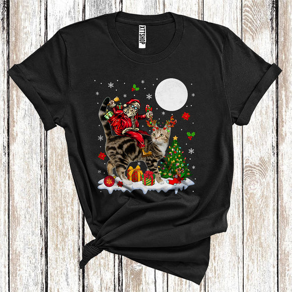 MacnyStore - Santa Riding Reindeer American Shorthair Cat Cute Christmas Tree Lights Cat Owner Lover T-Shirt
