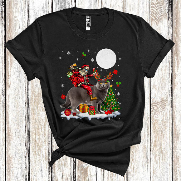 MacnyStore - Santa Riding Reindeer British Shorthair Cat Cute Christmas Tree Lights Cat Owner Lover T-Shirt