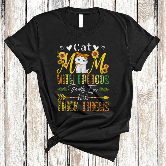 MacnyStore - Cat Mom With Tattoos Pretty Eyes And Thick Thighs, Lovely Mother's Day Sunflowers, Family T-Shirt