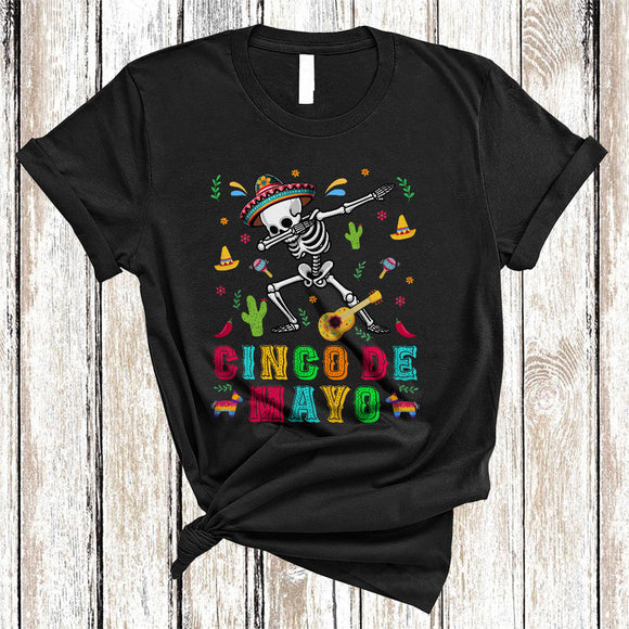 MacnyStore - Cinco De Mayo, Joyful Flowers Dabbing Skeleton Wearing Sombrero, Mexican Pride T-Shirt