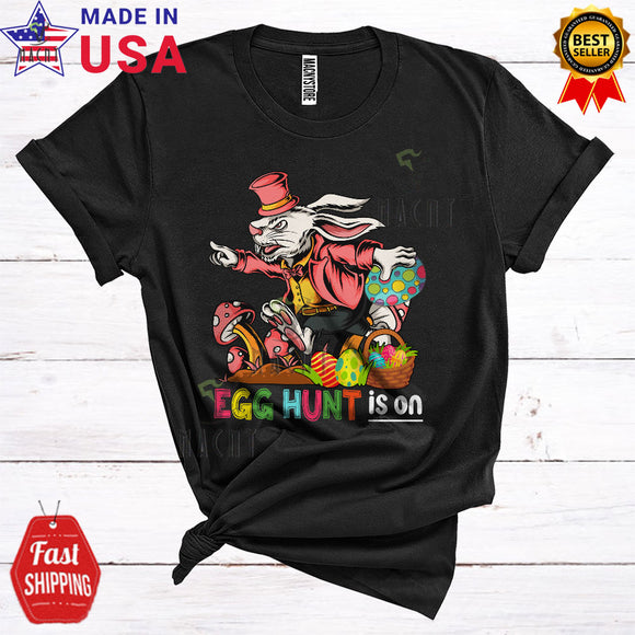 MacnyStore - Egg Hunt Is On Funny Cool Easter Day Bunny Holding Egg Basket Bunny Egg Hunting Lover T-Shirt
