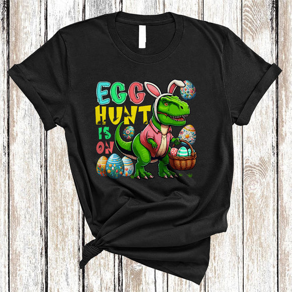 MacnyStore - Egg Hunt Is On, Adorable Easter Day Bunny T-Rex Hunting Eggs, Dinosaur Lover Family Group T-Shirt