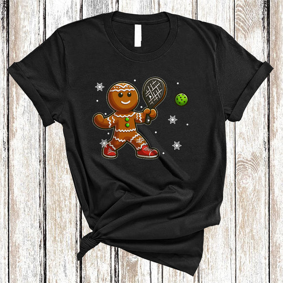 MacnyStore - Gingerbread Playing Pickleball, Cheerful Funny Christmas Gingerbread Sport Player, X-mas Cookies T-Shirt