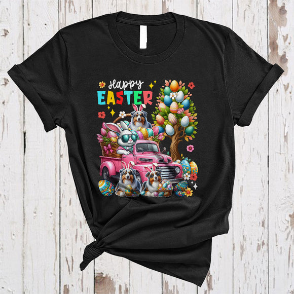 MacnyStore - Happy Easter, Colorful Easter Egg Tree Three Australian Shepherds, Bunny Driving Egg Truck T-Shirt