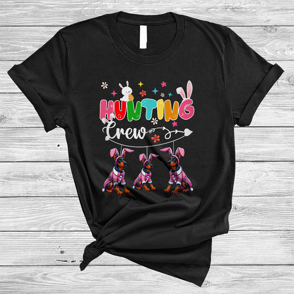 MacnyStore - Hunting Crew, Adorable Easter Day Three Bunny Dobermann Hunting Easter Eggs, Animal Lover T-Shirt