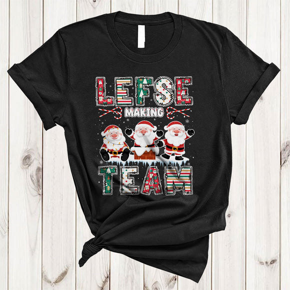 MacnyStore - Lefse Making Team, Adorable Christmas Three Santa Lover, Snow Around X-mas Group T-Shirt