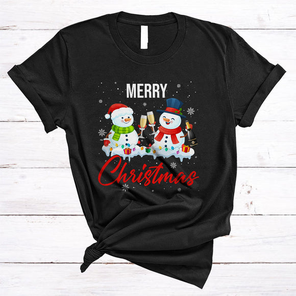 MacnyStore - Merry Christmas, Cute Couple Snowman Drinking Champagne, X-mas Lights Snow Around T-Shirt