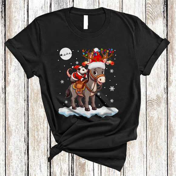 MacnyStore - Opossum Riding Donkey As Reindeer, Lovely Christmas Animal Snow, Santa Opossum Lover T-Shirt