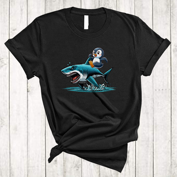 MacnyStore - Penguin Riding Shark, Humorous Cute Sea Wild Animal, Matching Sea Ocean Biologists Lover T-Shirt