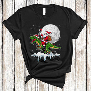 MacnyStore - Santa Riding T-Rex Reindeer, Humorous Christmas Santa T-Rex, X-mas Lights Animal Lover T-Shirt