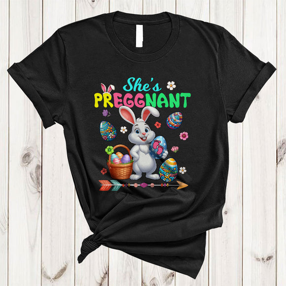 MacnyStore - She's Preggnant, Awesome Easter Day Bunny Floral Egg Hunt, Pregnancy Announcement Family T-Shirt