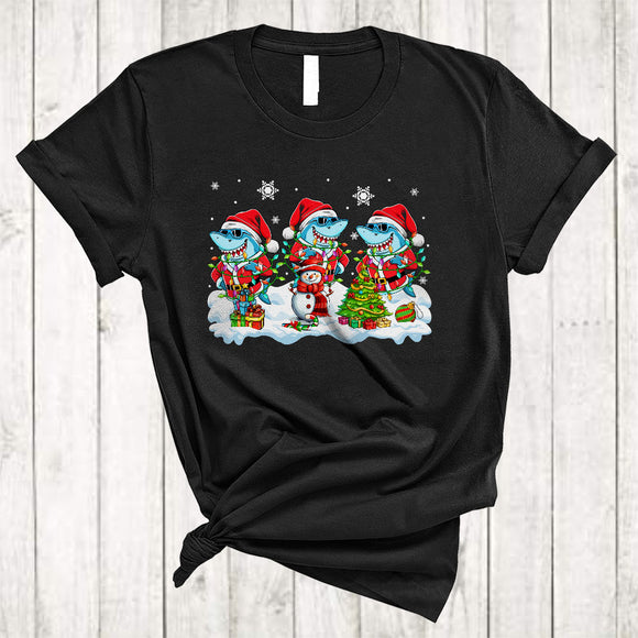 MacnyStore - Three Santa Sharks With Snowman, Colorful Christmas Lights Shark Sea Animal, X-mas Group T-Shirt