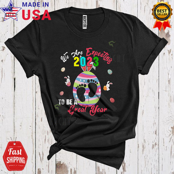 MacnyStore - We Are Expecting 2023 To Be A Great Year Funny Cute Pregnancy Easter Day Bunny Egg Family Lover T-Shirt