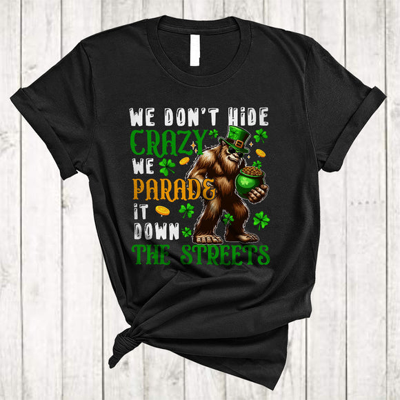 MacnyStore - We Don't Hide Crazy, Amazing St. Patrick's Day Bigfoot Holding Pot Of Gold, Lucky Shamrock T-Shirt